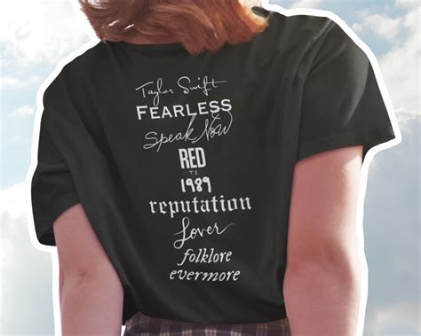 Taylor swift fearless t shirt. 🎶 Recreate Taylor's cheeky "22" outfit with red heart-shaped sunnies, a black fedora, and a "not a lot going on at the moment" (understatement of the year, TBH) T-shirt. Don't forget the cherry ... 