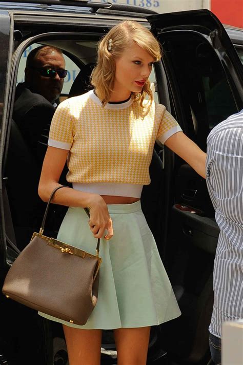 Taylor swift july 1. 2 Jul 2014 ... Taylor Swift wearing Dolce & Gabbana Sara Bag, Anthropologie Rose Heath Bobby Set, Miu Miu Short Sleeved Wool. 