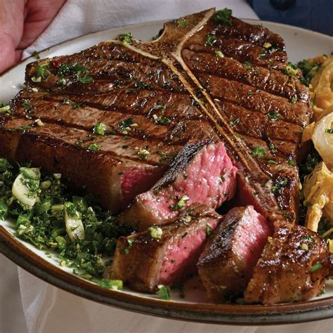 Tbones - Our Food. We proudly serve Certified Angus Beef brand steaks and burgers to provide you with the highest quality beef available. Learn More. Homegrown Hospitality. Comprised of several different concepts, each restaurant has its own distinct personality that embodies a casual, friendly and eclectic atmosphere. Learn More.
