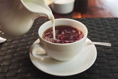 Tea and milk. In a formal setting, milk is poured after the tea. You may have heard or read that milk precedes the tea into the cup but this is not the case. You do not put ... 