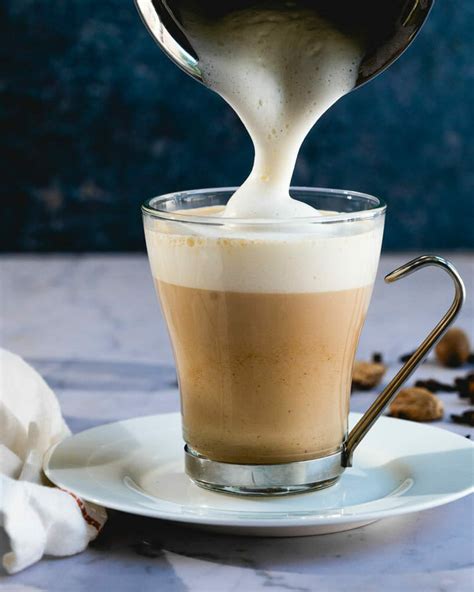 Tea latte. 2. Make quick brown sugar syrup. Stir brown sugar and hot water until sugar dissolves. 3. Assemble drink. Put brown sugar simple syrup into a cup and add ice then slowly pour milk directly on top of the ice. Slowly pour cooled down tea directly on top of the ice. Stir before drinking. 
