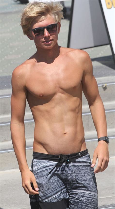 Teen boy showing his tan lines. .  ...