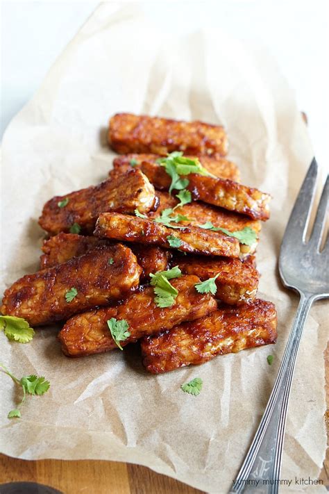 Tempeh recipes. Bake the tempeh and veggies in the oven for 25 minutes until caramelized and golden-brown. While the tempeh and veggies roast, prep the rest of the bowl. Start by cooking the white rice according to the package instructions. While the rice is cooking, prepare the yogurt dressing. 