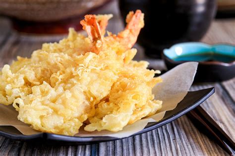 Tempura mix. Preheat the oil to 355 degrees F, or 180 C. Line a wire rack with a few sheets of paper towel to drain the fried tempura. Add all of the vegetables to a bowl and then mix in the cake flour to coat the vegetables while breaking up … 