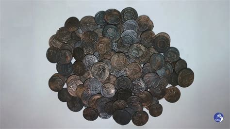 Tens of thousands of ancient coins have been found off Sardinia. They may be spoils of a shipwreck