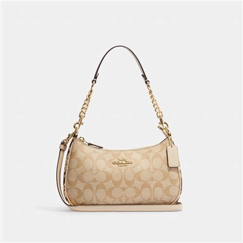 Coach Parker 18 Shoulder Bag . Special Price: INR10,000 + Order Processing Fees* Inclusive of all taxes and fees Apprised MRP: INR24,606 . 112 EMI Available . View Details . GENTLY USED. ... She is known to have included the brass toggle hardware on the Coach bags, as well as the Coach duffle bags. In 2001 the iconic Coach Signature collection ....