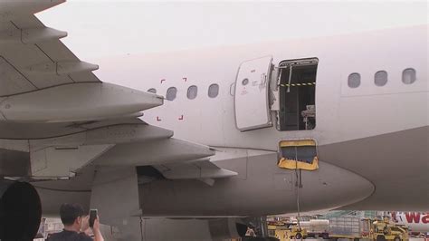 Terrifying moments as plane door opens midair on Asiana Airlines flight landing in South Korea