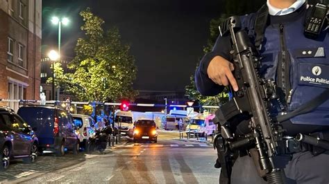 Terror alert raised to highest level in Brussels after 2 people shot dead