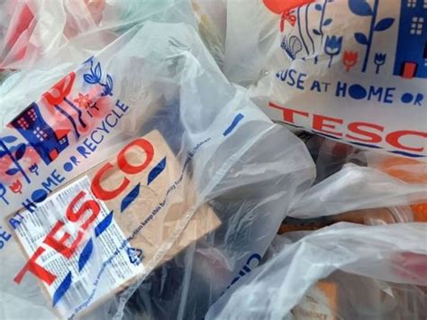 Tesco to end sales of 5p carrier bags - the Guardian