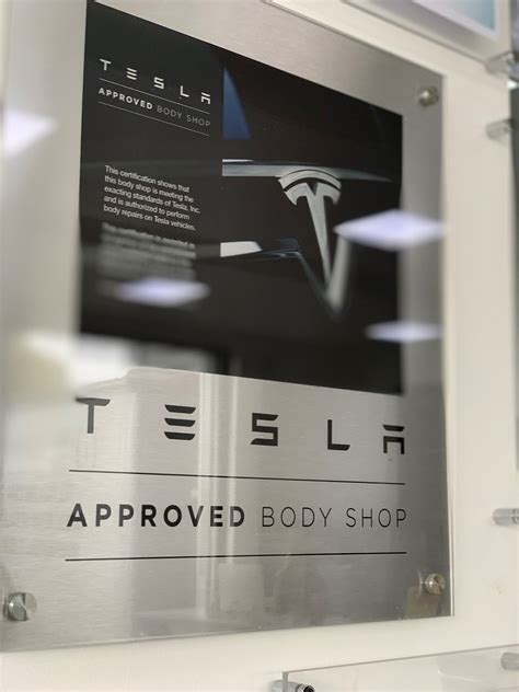 Tesla approved body shop. 