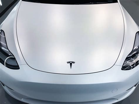 Tesla ceramic coating. Consider Chicago Ceramic Garage for all your paint correction, ceramic coating, and clear bra needs. Attention Tesla owners! Chicago Ceramic Garage is an exclusive Tesla detailing shop, servicing all Tesla makes and models with ceramic coatings, paint correction services, and more. Call (312) 825-8518 today. 