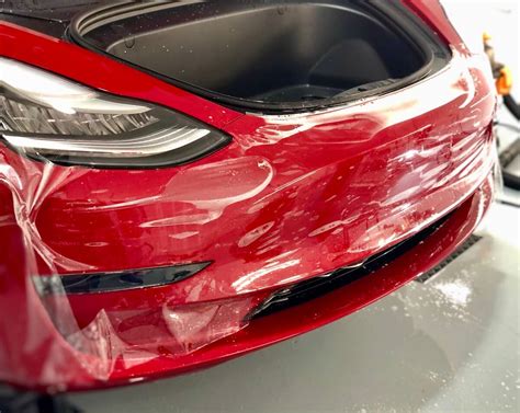 Tesla paint protection. Both paint protection film (PPF) and ceramic coating offer different types of protection for your Tesla’s paint. PPF is a clear film that is applied to the surface of your car’s paint, while ceramic coating is a liquid polymer that bonds with the surface of your car’s paint. 