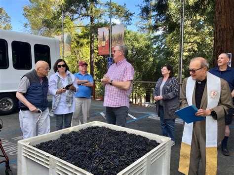 Testarossa celebrates ‘mostly good’ yields with 136th grape blessing