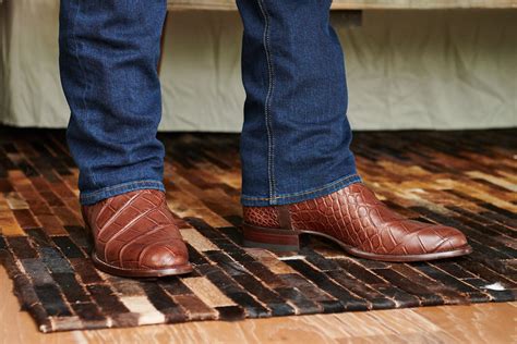 Tevocas - A Pure Western Square Toe. The Doc is a down-home dress boot with a classic western profile. It features a broad square toe with signature Tecovas toe stitching, a robust, double-stitched welt, contrasting stitch pattern along the shaft, and a 1 ½” straight heel with just the right amount of ledge for jean stacking.