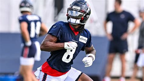 Texans WR Metchie on field for 1st day of camp after missing last year following cancer diagnosis