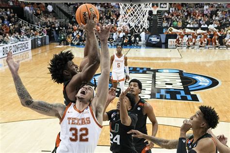 Texas Longhorns lose double-digit lead, fall to Miami Hurricanes 88-81 in Elite 8