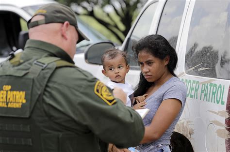 Texas separates migrant families, detaining fathers on trespassing charges in latest border move