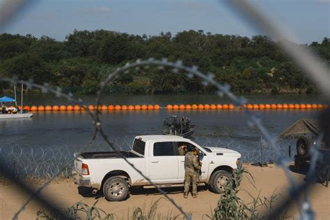 Texas troopers told to push back migrants into Rio Grande River and ordered not to give water amid soaring temperatures, report says