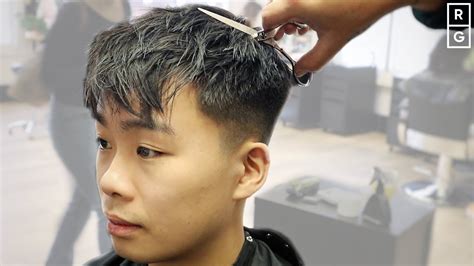 Textured fringe asian. To achieve this look, start by growing out your hair to medium length, keeping the top longer than the sides and back. Next, get the back and sides trimmed short, while leaving the top untouched. For added flair, consider adding some wavy texture to the top. This will give your Asian mullet a unique and trendy twist. 