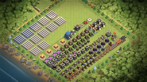 This is a Town Hall 12 (Th12) Hybrid/Trophy [Loot Protection] Base 2022 Design/Layout/Defence with Copy link. It defends really well against a lot of differe.... 