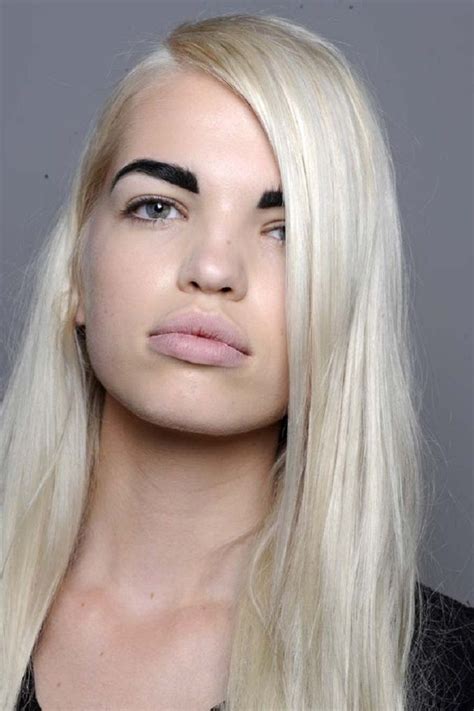 The Alluring Contrast: Blonde Hair and Dark Eyebrows