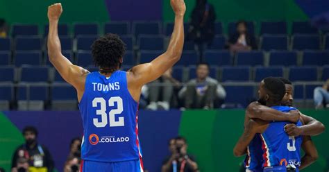 The Dominican Republic tops its World Cup group and advances with a 75-67 victory over Angola