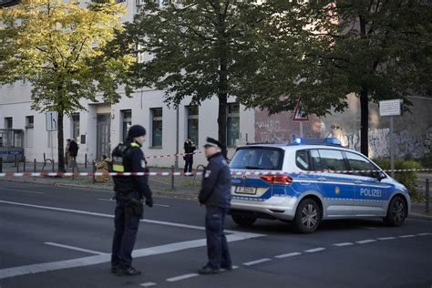 The German chancellor condemns a firebomb attack on a Berlin synagogue and vows protection for Jews