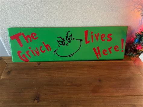 The Grinch Lives Here Outdoor Sign Etsy