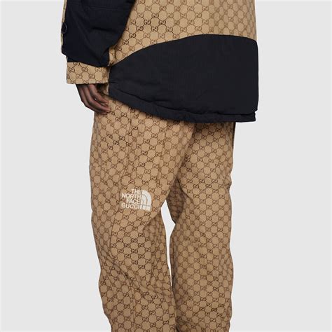 The North Face x Gucci dungarees