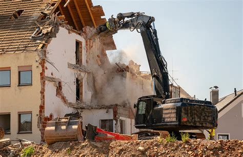 The Pros And Cons Of Different Building Demolition Methods - W.