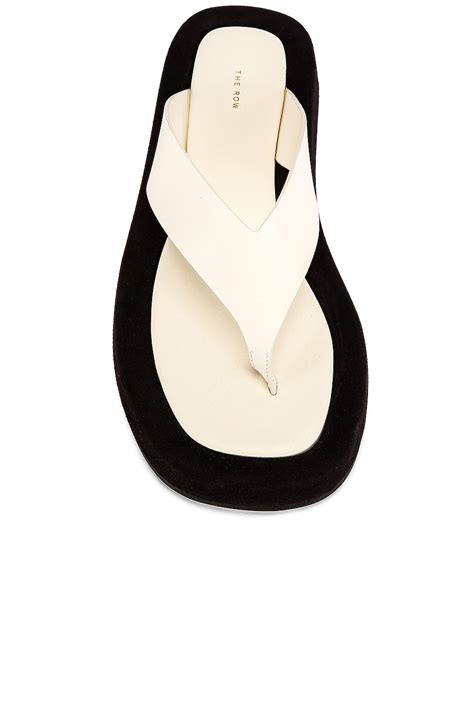 The Row Ginza Thong Sandals in Black FWRD