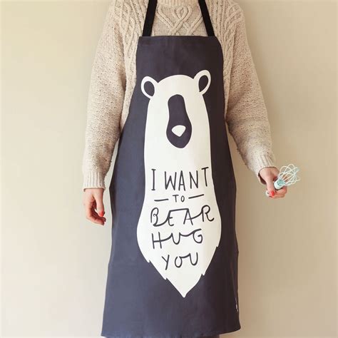 The bear apron. Bragard is highly regarded by the industry for being durable and affordable and they are the standard at Chef Thomas Keller's restaurants. $34.95 is a bargain for an apron you'll be using quite a bit! That Honey Bear apron is adorable though. 
