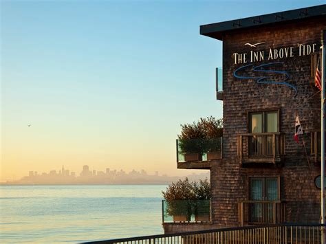 The inn above tide. The Inn Above Tide is situated in Sausalito, a bedroom community of San Francisco, at the edge of the Bay. The hotel is right next to the ferry terminal and a 10-minute walk from Sausalito's little main drag. It's a half-hour drive into downtown San Francisco over the Golden Gate Bridge or a 25-minute ferry ride to San Francisco's Ferry Building. 