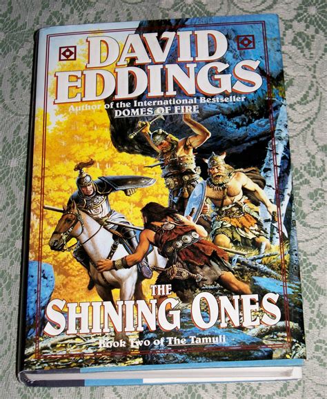 The shining ones. The Shining Ones by David Eddings is a New York Times best seller published by Del Ray Fantasy. This book is about a Padion Knight named Sparhawk who travels all over his world with his loyal companions. His traveling companions consist of the child goddess Aphrael, Queen Ehlana, Talen a young knight (a thief in his own time), Sephrenia (a ... 