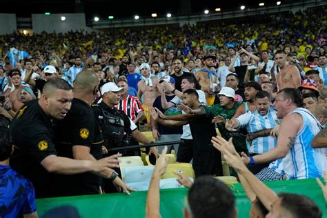 The start of the Argentina-Brazil World Cup qualifying match has been delayed due to a fight among fans in the stands