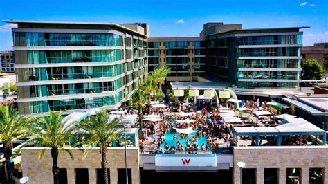 The w scottsdale. Turn up the volume on your weekends at W Scottsdale's WET Deck. Join us every Friday- Sunday from 10AM-6PM as we make a splash with pulsating music, bottle service and the ultimate party vibe. Expect a crowd, seating is limited and books fast. Book your VIP table or cabana by texting 602.405.0099 or email vip@spellboundeg.com . … 