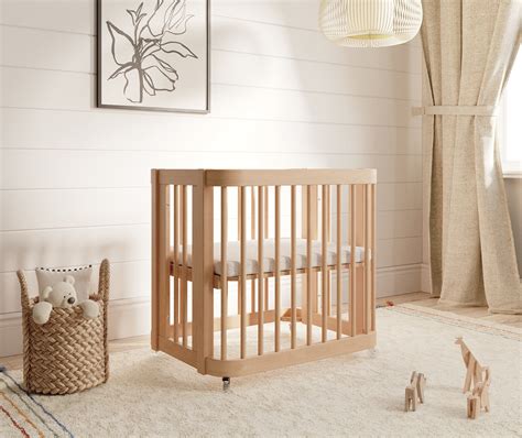The wave crib. According to U.S regulations, a standard full-size crib is 30 inches wide and 54 inches long. A standard crib mattress is 52 by 28 inches. The adjustable railing must be 26 inches ... 