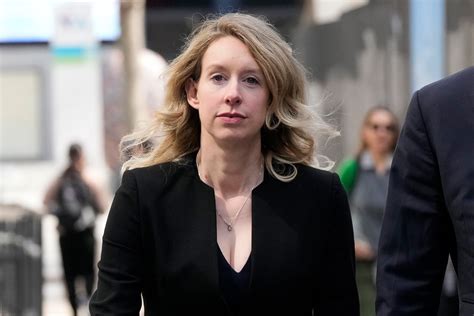 Theranos founder Elizabeth Holmes’ sentence reduced by almost two years