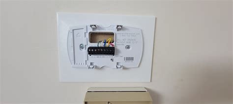 Thermostat wall plate universal.  Measure the enclosure opening to confirm compatibility...