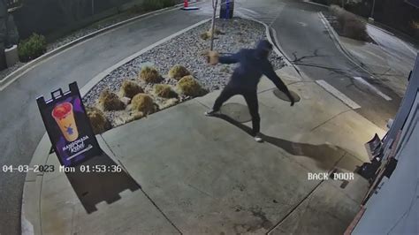 Thief caught on camera smashing rock through Loveland coffee shop