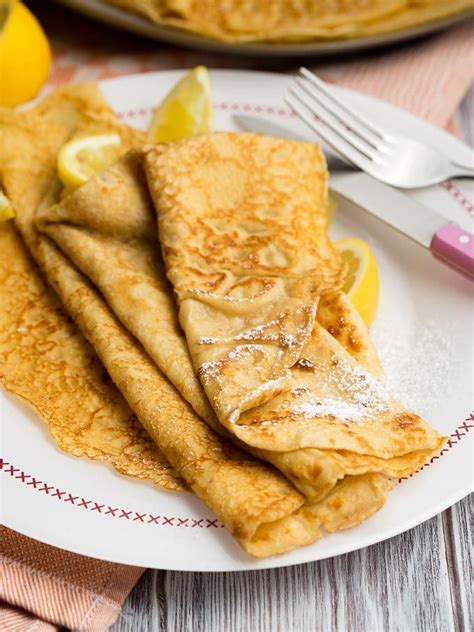 Thin pancakes. Learn how to make thin, lacy pancakes with milk, water and butter from Delia Smith. Serve with lemon juice and sugar for a classic British treat. 
