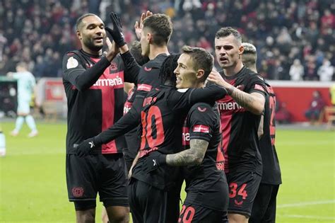 Third-tier Saarbruecken stuns Frankfurt to keep dream German Cup run going. Leverkusen wins