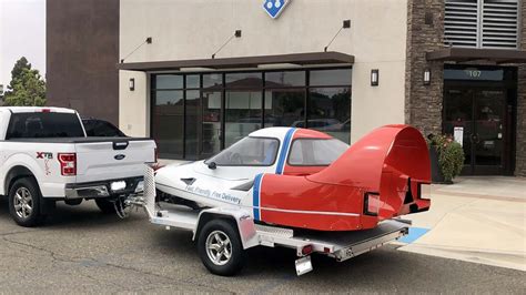 This 1980s Domino’s delivery car looks like a spaceship, and you can buy it