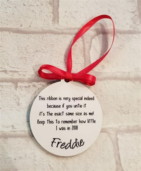 Check out our ribbon ornament poem selection for the very best in unique or custom, handmade pieces from our ornaments shops. ... Father’s Day Gifts 2023 Gifts for Him ... Kids Christmas Keepsake Bauble, Personalised Bauble, Measured Ribbon Bauble, unique kids tree decoration,special bauble (3k) $ 11.94 .... 