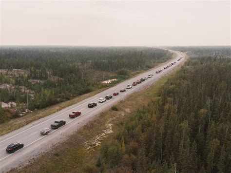 Thousands evacuate as wildfire approaches capital of Canada’s Northwest Territories