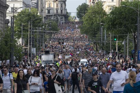 Thousands in Serbian capital protest pro-government TV station after 2 mass shootings in May