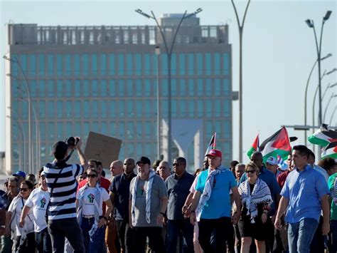 Thousands led by Cuba’s president march in Havana in solidarity with Palestinian people