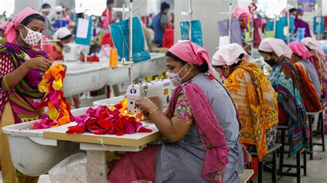 Thousands of Bangladesh’s garment factory workers take to the streets demanding better wages