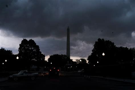 Thousands of flight cancelations and power outages as strong storms move into DC area