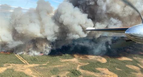 Thousands remain out of homes as wildfire officials urge caution for long weekend